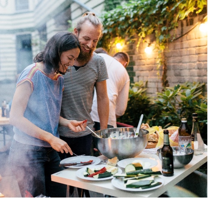 Couple enjoying a backyard party