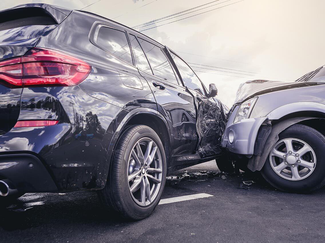 Two cars that have just collided in an accident