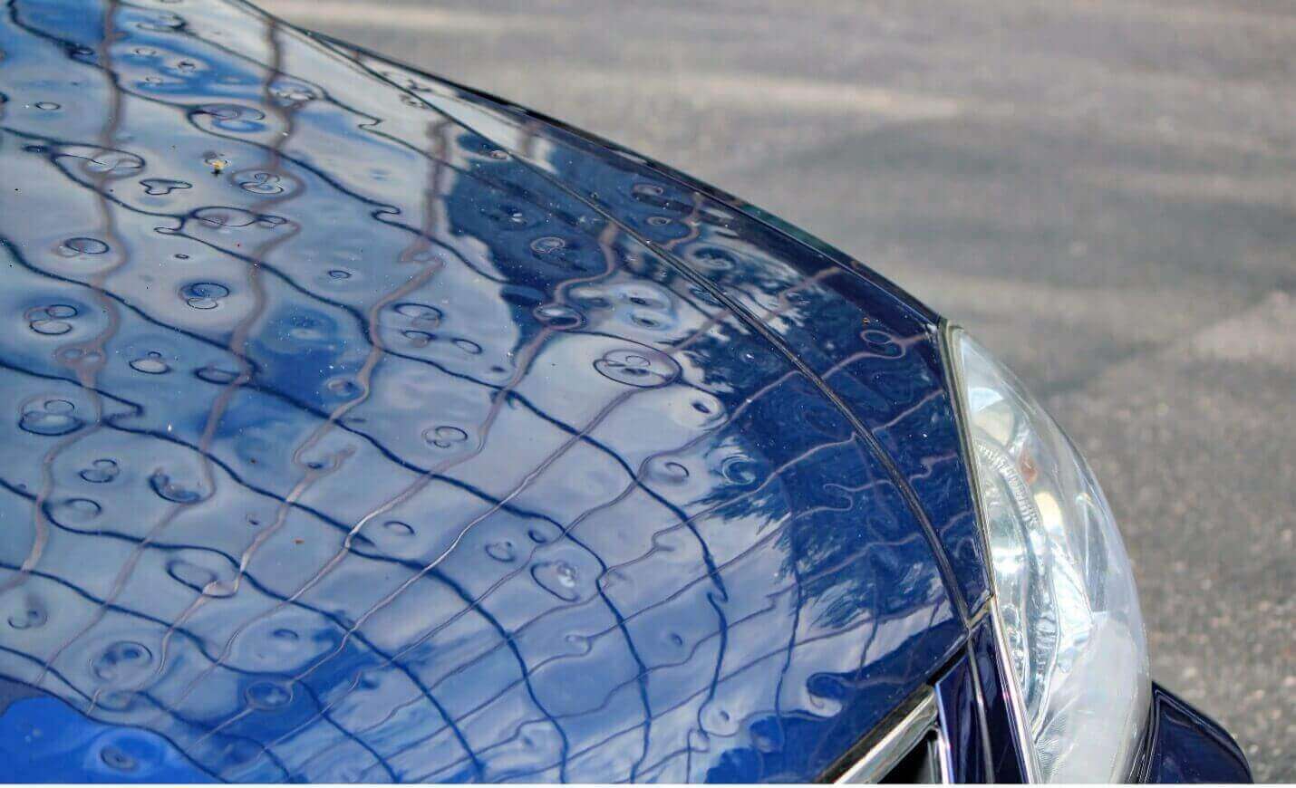 Front of car damaged by hail