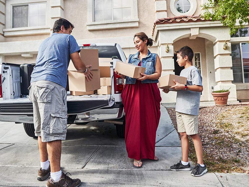 Family in loading their truck to safely evacuate