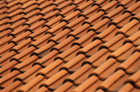 Orange shingle roof of a house