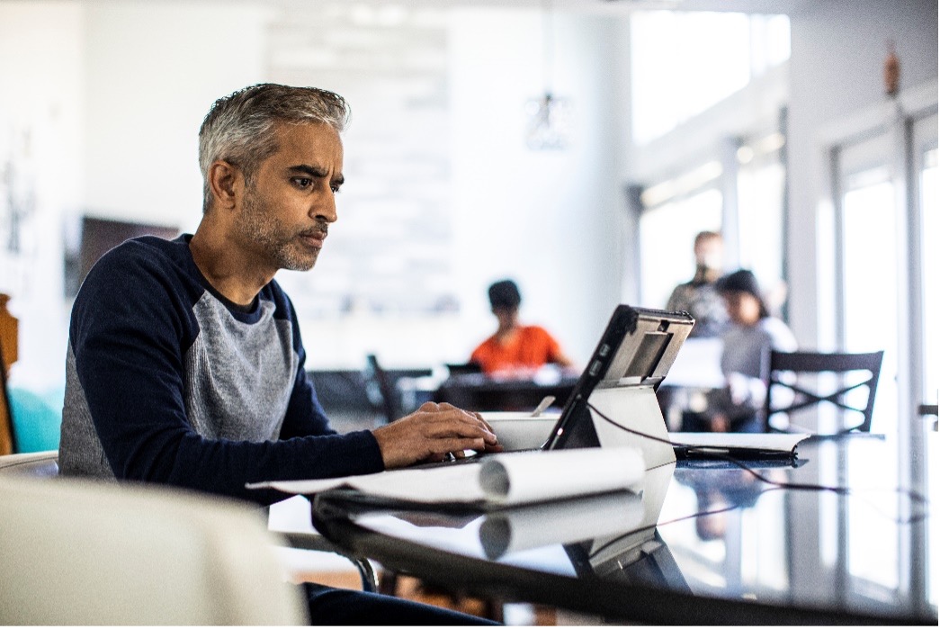 Man looking at his computer