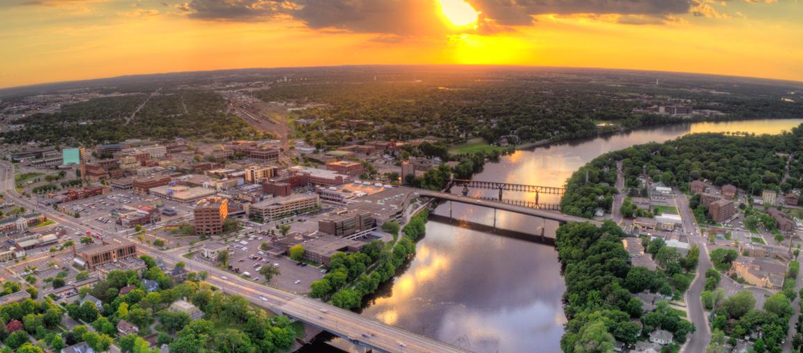 Helicopter view of a city with the Mississippi River