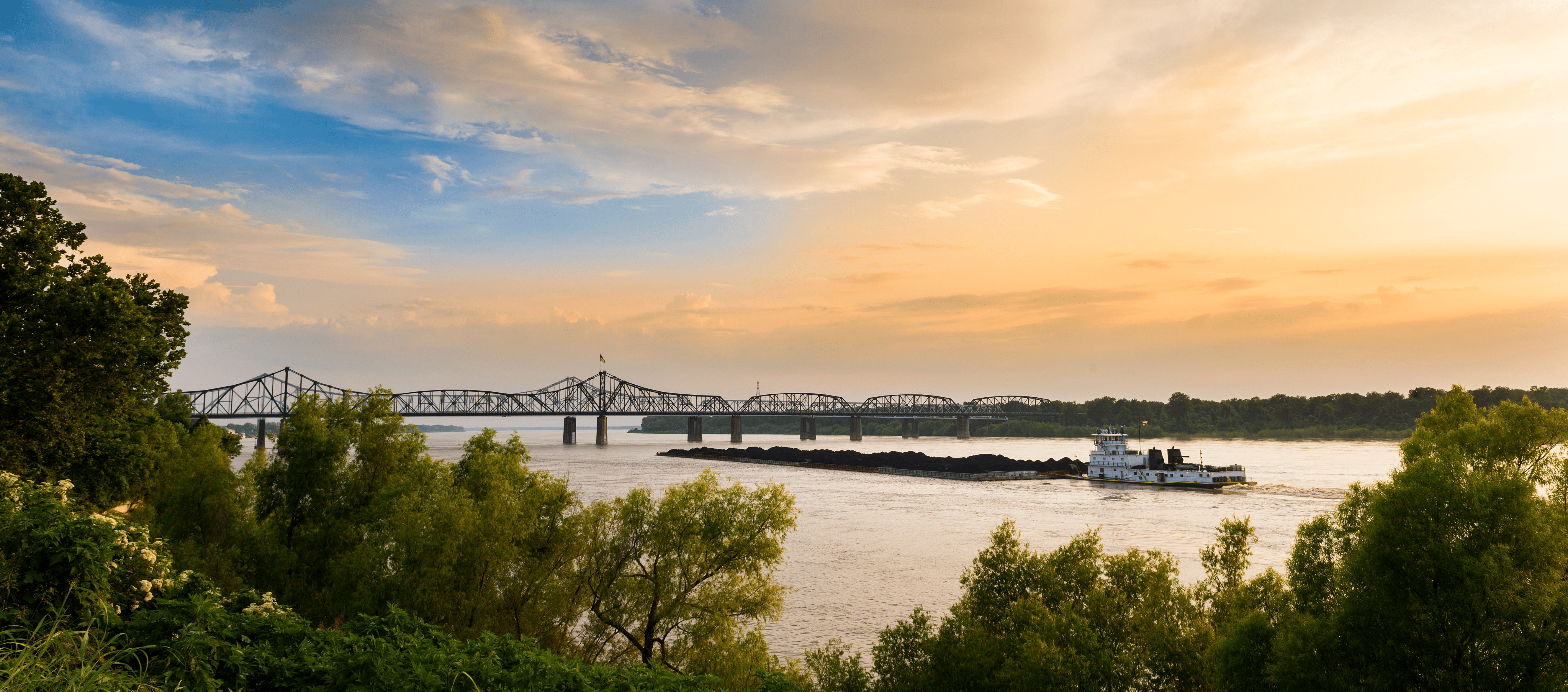 The sun setting over the Mississippi River