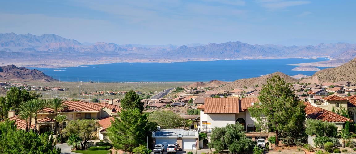 Nevada neighborhood with lake and mountains in the distance