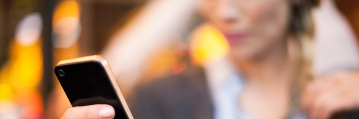 woman using social media app on phone woman using social media app on phone