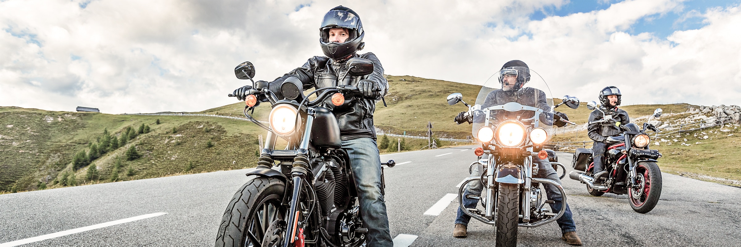 Group of motorcyclists riding safely