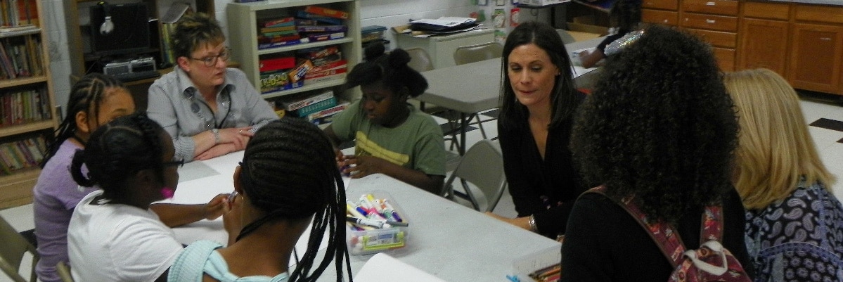 Dimond Bros. Insurance staff working with kids Dimond Bros. Insurance staff working with kids