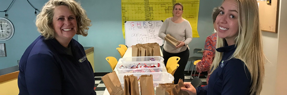 making snack bags for students in need