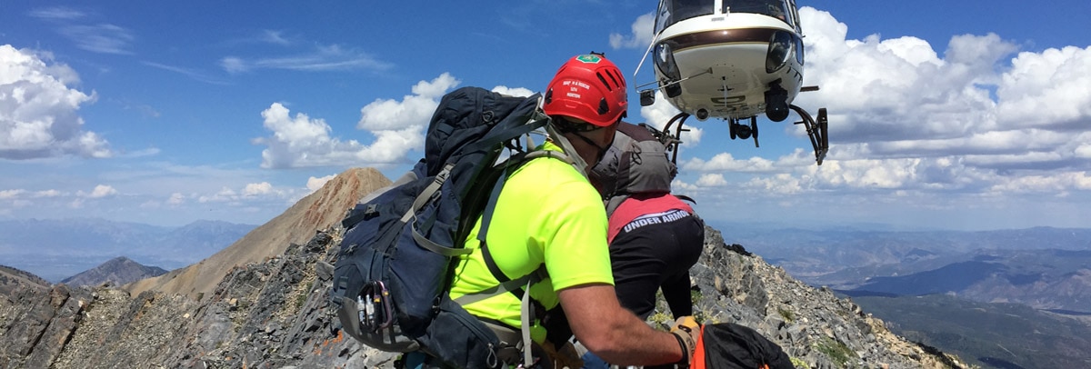 volunteer assisting with mountain rescue