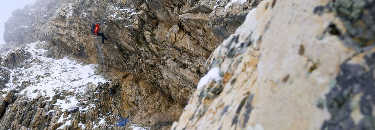 volunteer helping with a cliff rescue