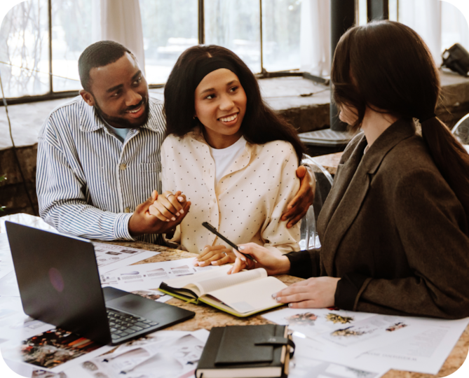An event Planner discussing the event plan with her clients.